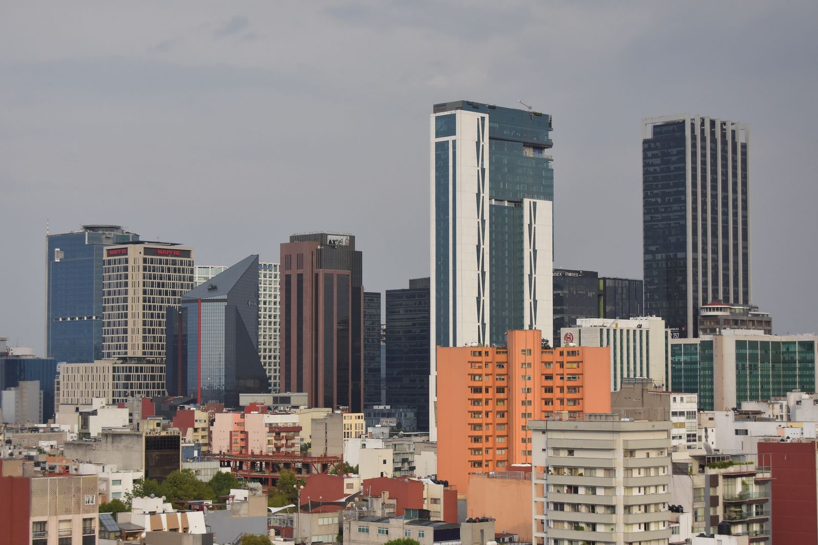Panoramic view of the Mexico City skyline with residential high-rise towers